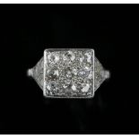 1930's diamond ring, set with nine old cut diamonds, estimated total diamond weight 0.80 carats,