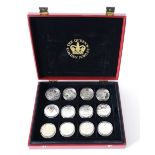 The Queen Elizabeth II Golden Jubilee silver coin collection, comprising a case containing 24