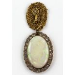 An opal and white sapphire pendant, in unmarked yellow metal mount with similar chain, both