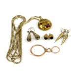 Antique jewellery mainly in gilt metal, including a round floral brooch pendant set with red paste