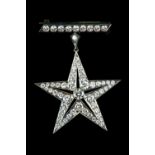 Art Deco period diamond star pendant, suspended from a bar brooch, the central stone 0.35 carats,