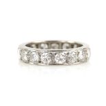Diamond full eternity ring, set with seventeen round brilliant cut diamonds, estimated total diamond