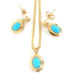 Pendant and earring set, oval cabochon cut turquoise, mounted in 9ct yellow gold , with flat curb