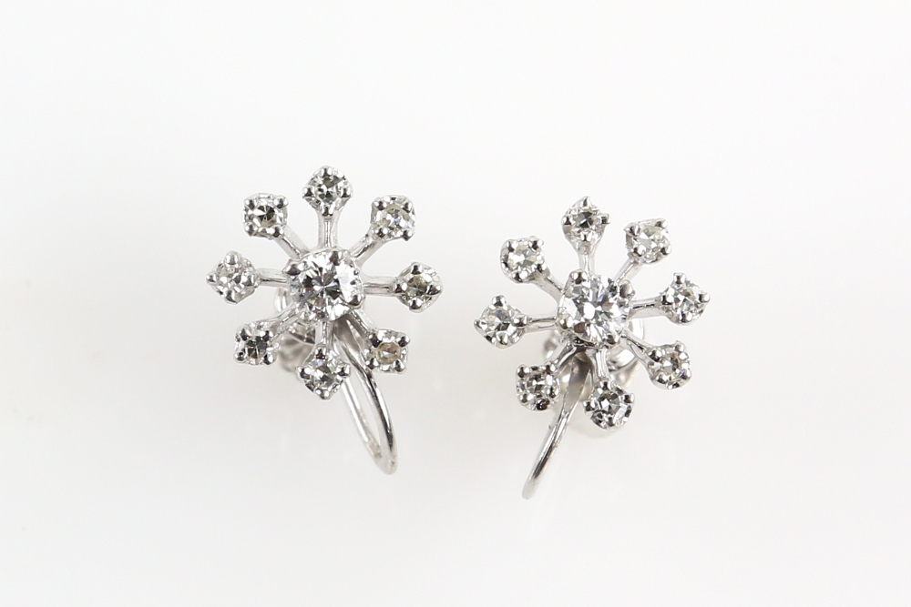 Diamond cluster earrings, set with round brilliant cut diamonds, estimated total diamond weight 0.68