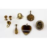 A group of gold jewellery set with citrines, a pear form pendant in 14 ct, another unmarked yellow