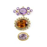 Four antique brooches, one oval cut citrine, 30 x 22mm, surrounded by beaded and floral border,