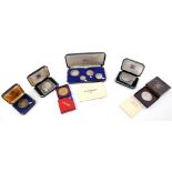 Various coins 1950s / 1960s. To include John Pinches Britannia silver four coin set commemorating