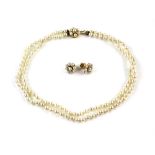 Double string of cultured pearls, to a gold bow clasp, length 60-61 cm, and a pair of gold and pearl