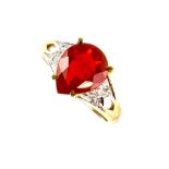 Fire opal and diamond ring, central pearl cut, estimated weight 2.35 carats, mounted in 9 ct