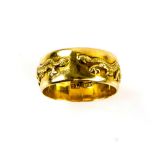 Chinese gold ring, with two dragons, stamped 20, testing as 18 ct or higher, ring size Y.