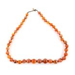 Graduated agate bead necklace, largest bead 19mm in diameter, strung with knots, 70cm in length