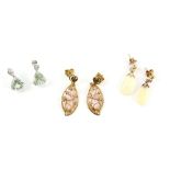 Three pairs of drop earrings, one set with trilliant fancy cut aquamarines and diamonds, mounted