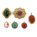 Group of hardstone jewellery, two brooches, and two pendants, silver gilt and gilt metal, and a gold
