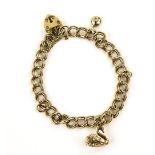 Gold bracelet, double chain links, with heart clasp and charm set with small diamond and another