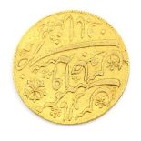 Islamic gold coin, weight 12.3 grams, diameter measuring approximately 26mm.