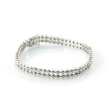 Modern double row diamond bracelet, rub over set with round brilliant cut diamonds, estimated