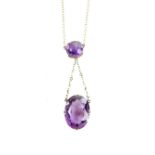 Edwardian amethyst set negligee necklace with central round amethyst suspending an oval cut stone 13