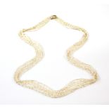 Fresh water pearl necklace and other items, including fancy link chain, pearl clip, heart charm