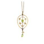 Edwardian peridot and seed pearl pendant, with leaf and flower settings, 5.7 x 2.3mm on flat curb
