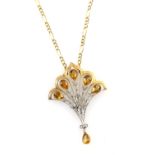 An early 20th C Belle Epoch pendant, arched fan form, set with citrine and diamond, and citrine
