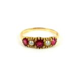 Victorian five stone ring, set with three oval cut rubies alternately set with two white pearls,