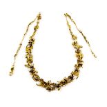 John Donald gold necklace, compromising of abstract graduated links, in 9 ct hallmarked London 1993,