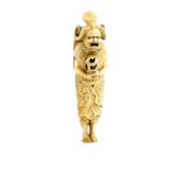 A tall stained ivory netsuke carved as Ryujin's attendant, wearing the Octopus head dress and