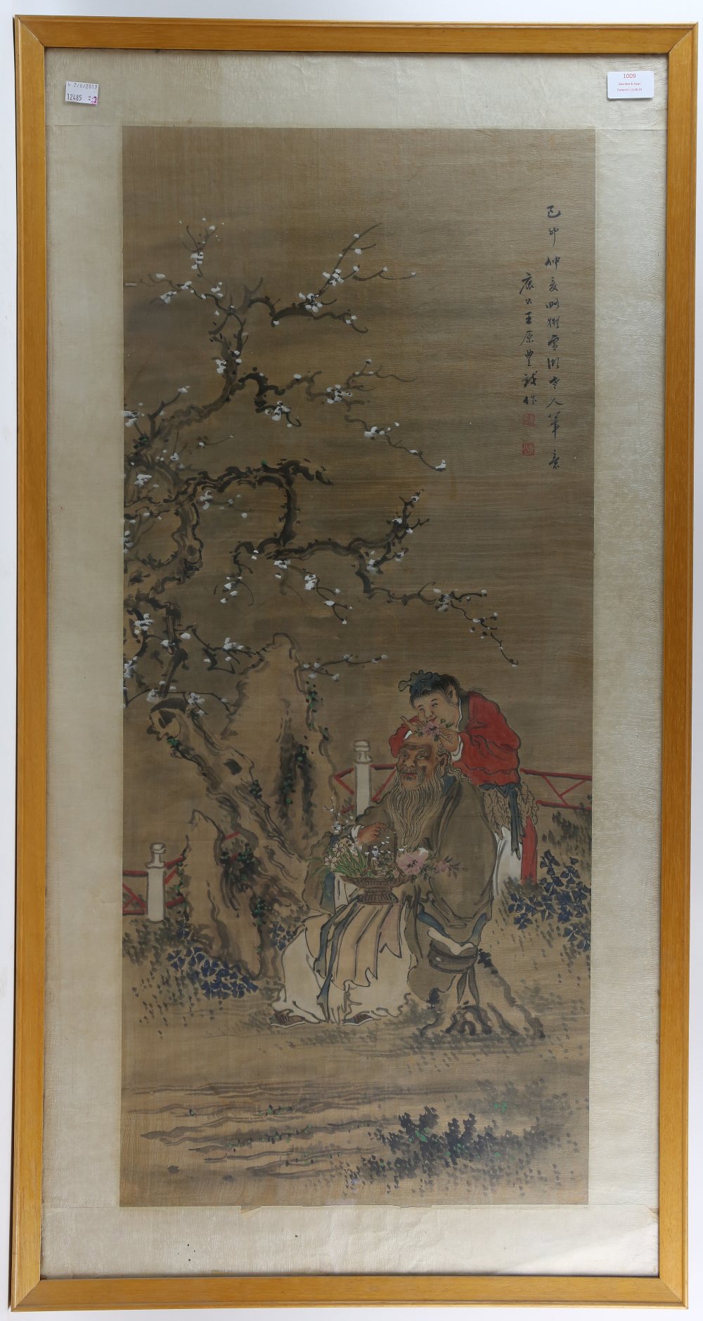 A Chinese picture of a seated scholar, holding an arrangement of flowers with an Acolyte behind him,