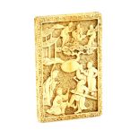 An elegant Canton ivory card case, carved on both front and back with Manchu or Chinese figures in