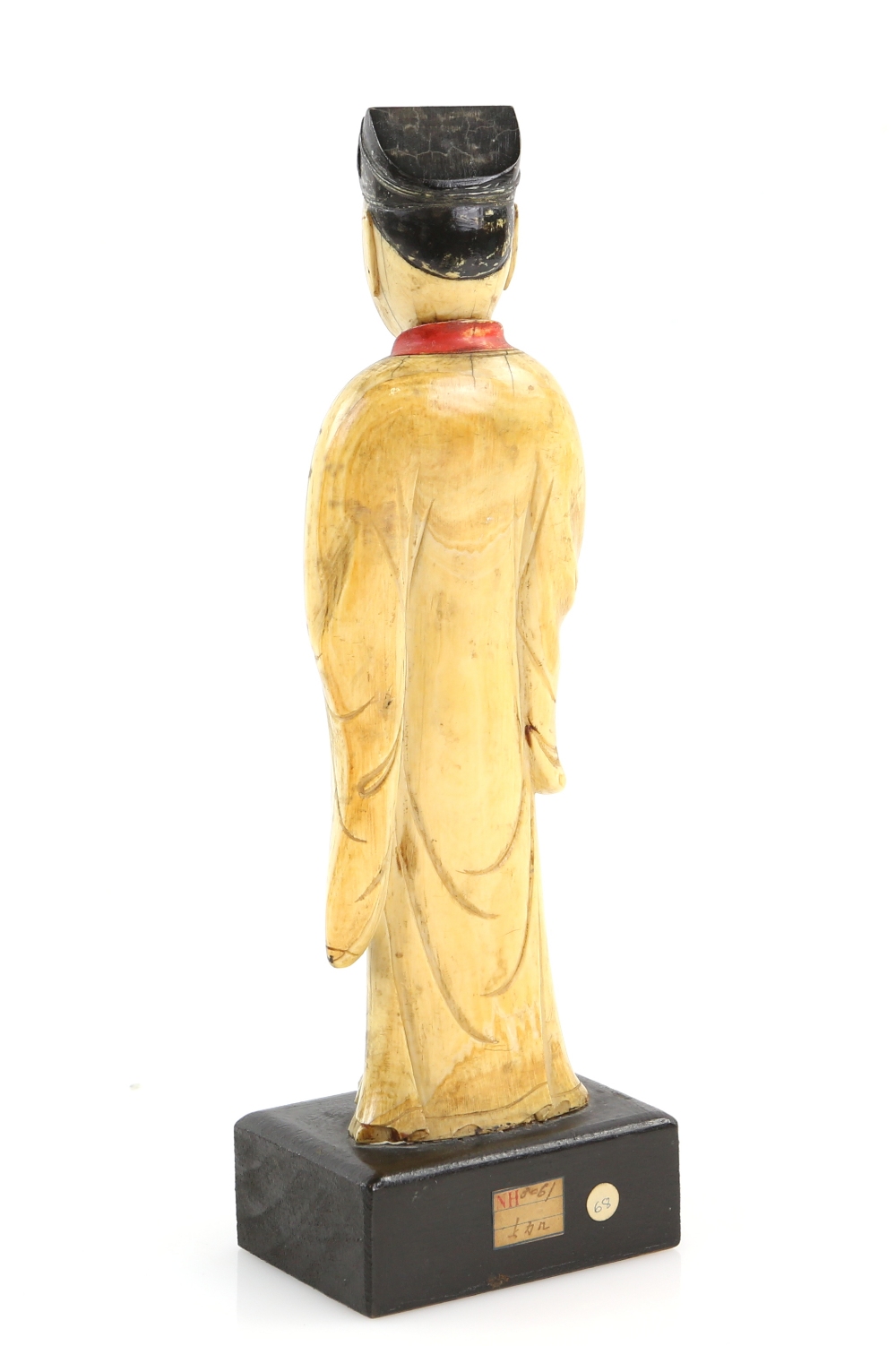 A Chinese ivory carving of a standing scholar, 21 cm high, Qing Dynasty, attached to a rectangular - Image 2 of 2