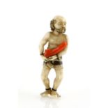A stained ivory netsuke with small himotoshi, carved as a standing coral fisherman, signed
