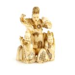 A stained ivory okimono carved as three actors from The Noh Drama, or from another theatre; one