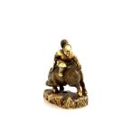 A stained ivory netsuke of the Minamoto Samurai, Nitta no Shiro, killing the boar, unsigned For a