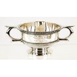 George V silver twin-handled bowl with beaded border, by Goldsmiths & Silversmiths Co. Ltd., London,