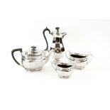 George V silver matched four-piece tea service, the teapot, sugar bowl and cream jug by Atkin