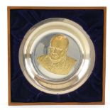 A Hallmarked Silver Winston Churchill Commemorative Plate, of plain circular design detailed to