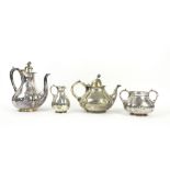 Collection of silver plated items to include a four piece tea service, tray, bottle labels and