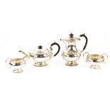 Edwardian silver four-piece tea and coffee service, by Walker & Hall, Sheffield 1909, of squat plain