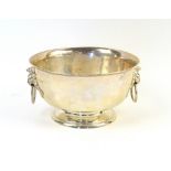 Edward VII silver punch bowl, the plain body with everted rim and lion-mask loop handles, by