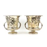 Victorian pair of silver wine coolers, by R & S Garrard & Co., London 1873/1874, the campana