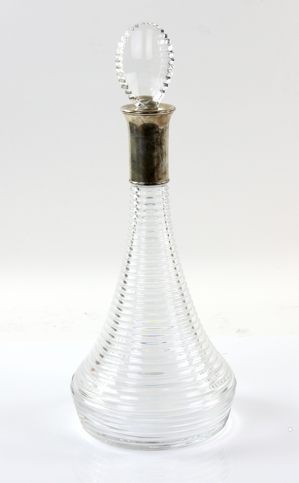 Mappin and Webb cut glass decanter with silver mount in original box.