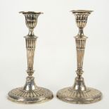 Edward VII pair of silver candlesticks with knopped and reeded stems, on oval feet, by Harrison