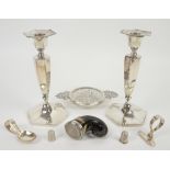 Group of silver items to include a spoon and pusher, by Mappin & Webb, Sheffield 1944, two thimbles,