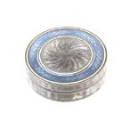 A French silver pill box the cover with blue enamel foliate border import mark for London 1910