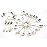 Scottish silver flatware to include two basting spoons, six serving spoons, four small ladles, ten