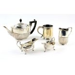 Edward VII silver teapot with half-gadrooned body, by William Hutton & Sons Ltd., London,1905, cream