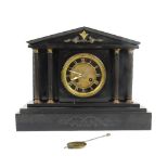 Late 19th /early 20th century black slate mantle clock the two train movement striking on a gong