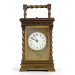 Early 20th century brass and glass repeating carriage clock, 18cm .
