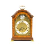 20th century mahogany cased mantel clock by Comitti of London triple train movement striking on a