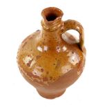 Brown glazed terracotta olive oil jug with ring handle 24cmProvenance: Part of 35 lot collection